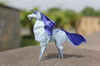 Illustration for article titled Papercraft Genius Creates Origami Dragons, Grim Reaper, and More